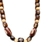 Single layer round and geometric beaded necklace