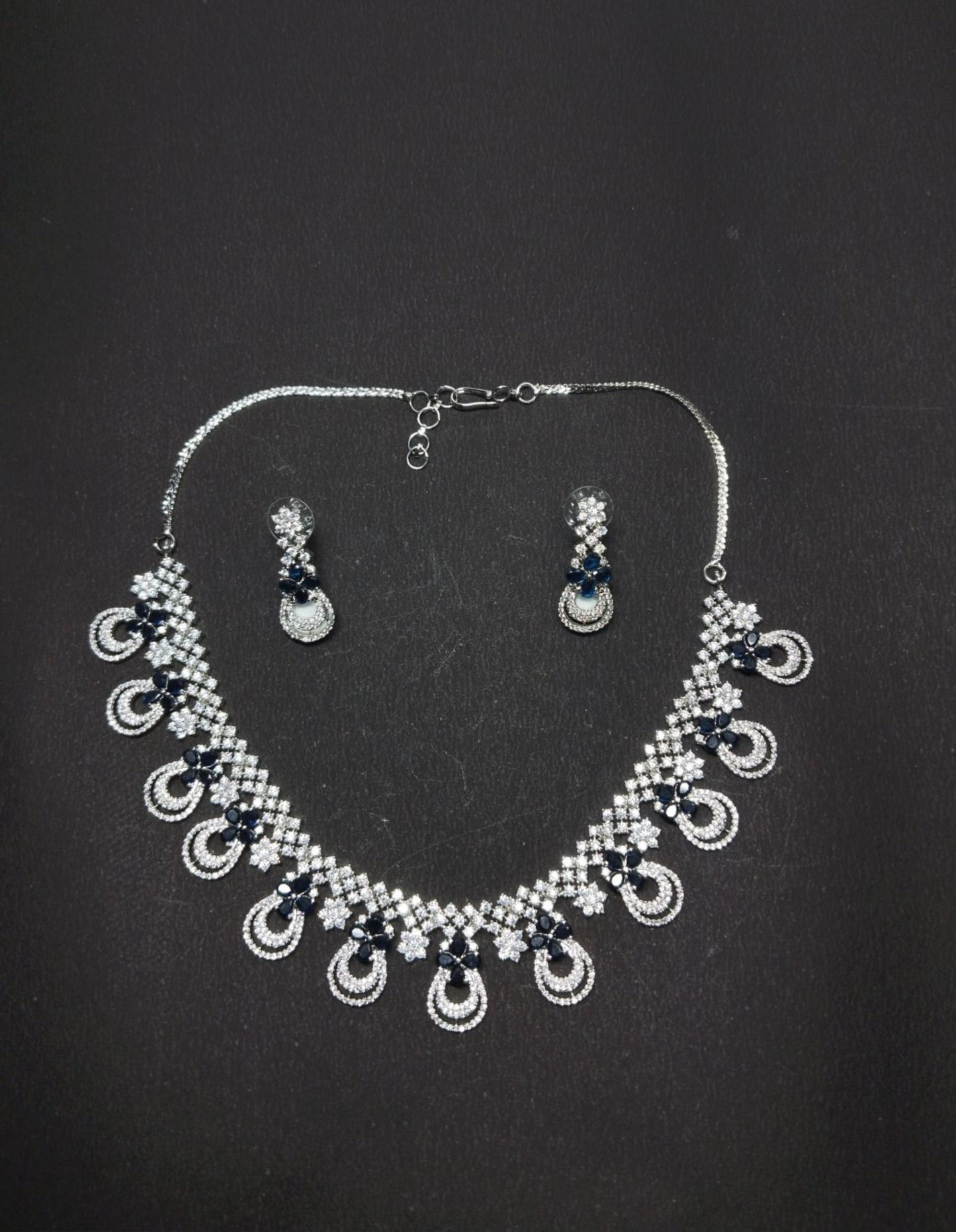 Rhodium-Plated American Diamond Stone-Studded Necklace Set with Earrings