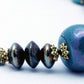 Shades of blue and golden beads necklace with stylish hook